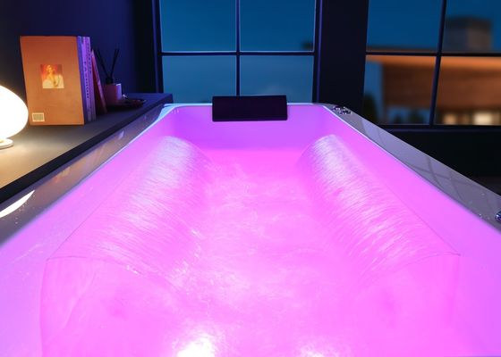 Massage Bathtub With Integrated Apron And Freestanding Chrome Waterfall Tap